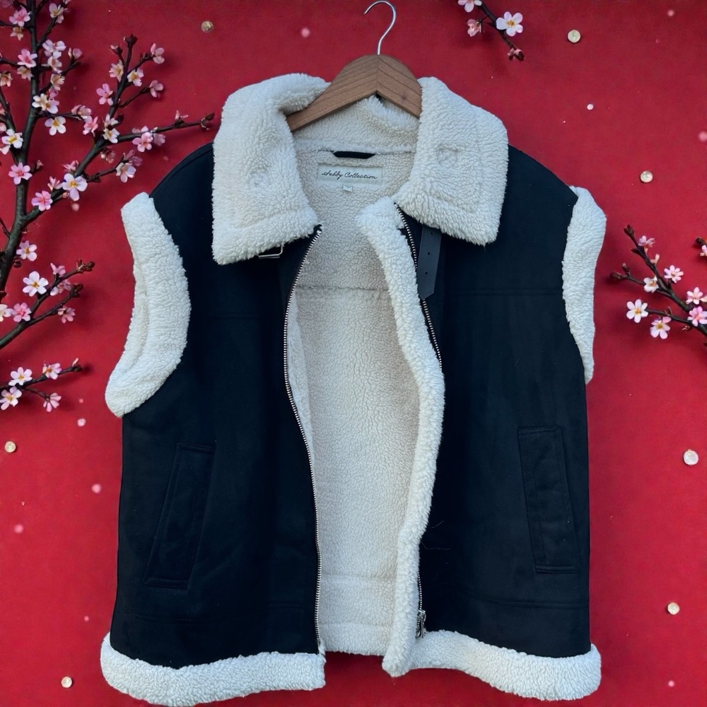 Sebby Collection Faux Fur Aviator Vest

Smoke/Pet Free